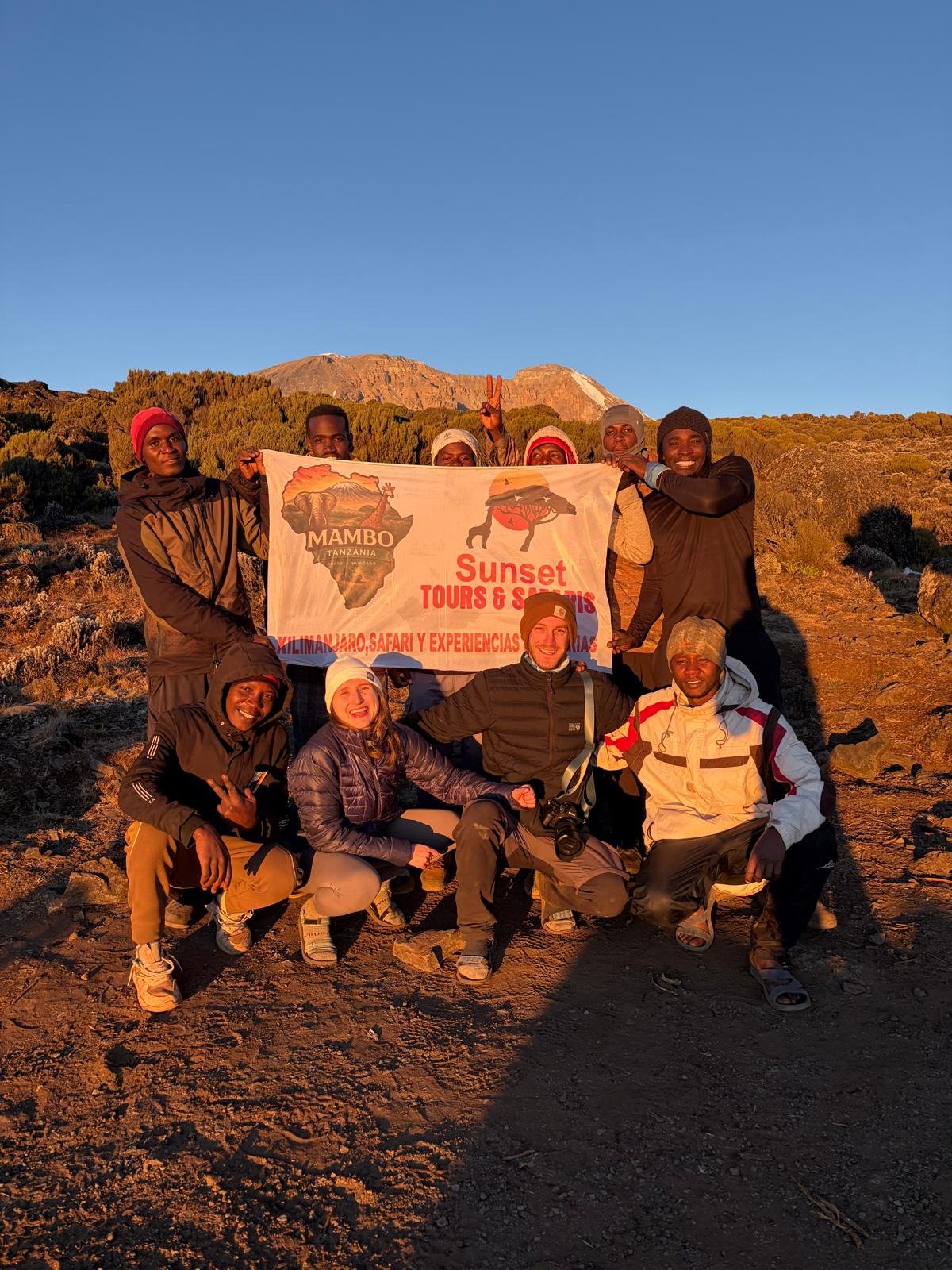 Kilimanjaro Climb Sunset Tours Banner Porters And Trekkers