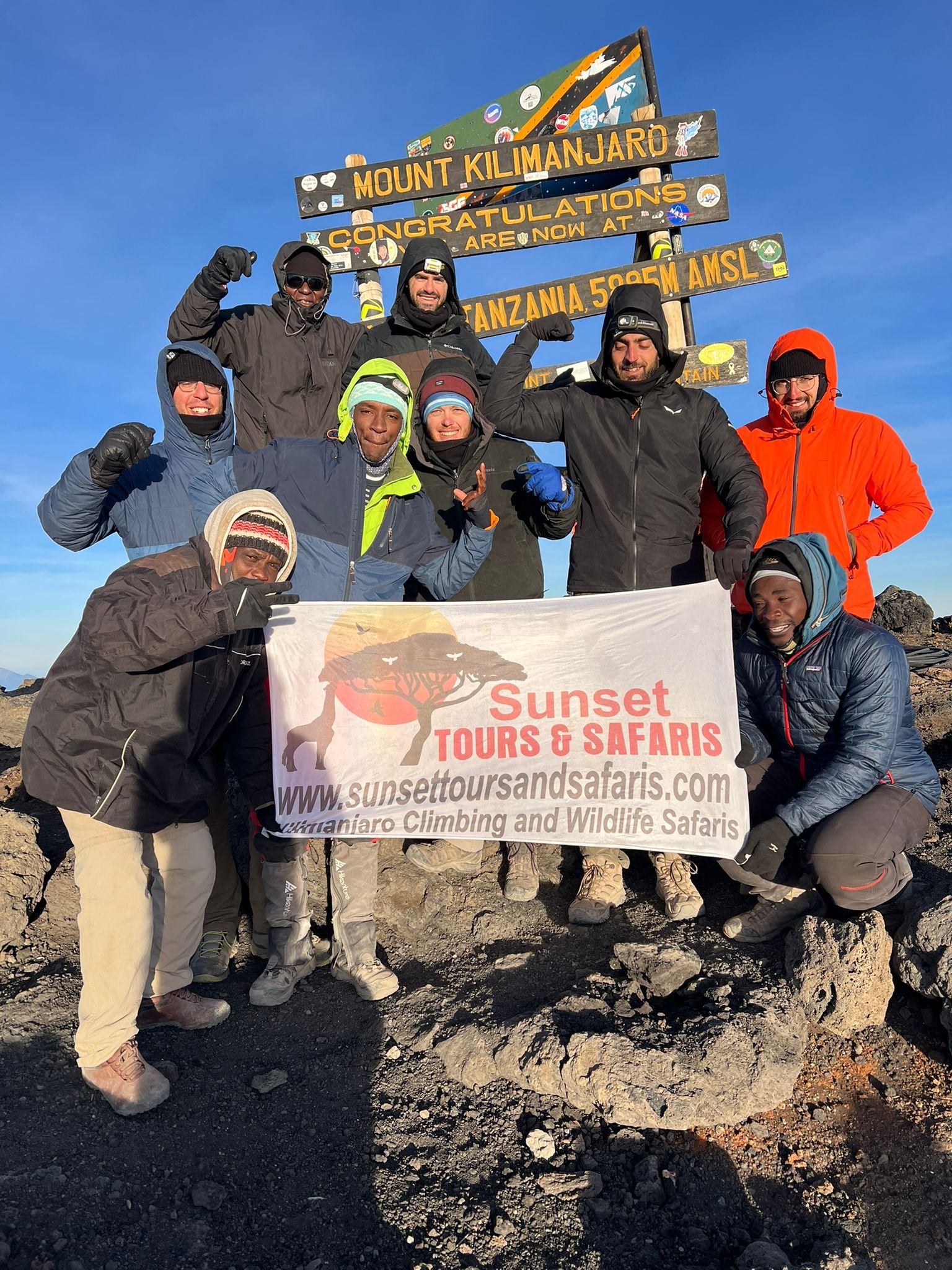 Sunset Tours Safaris Kilimanjaro Summit Group Celebration Banner